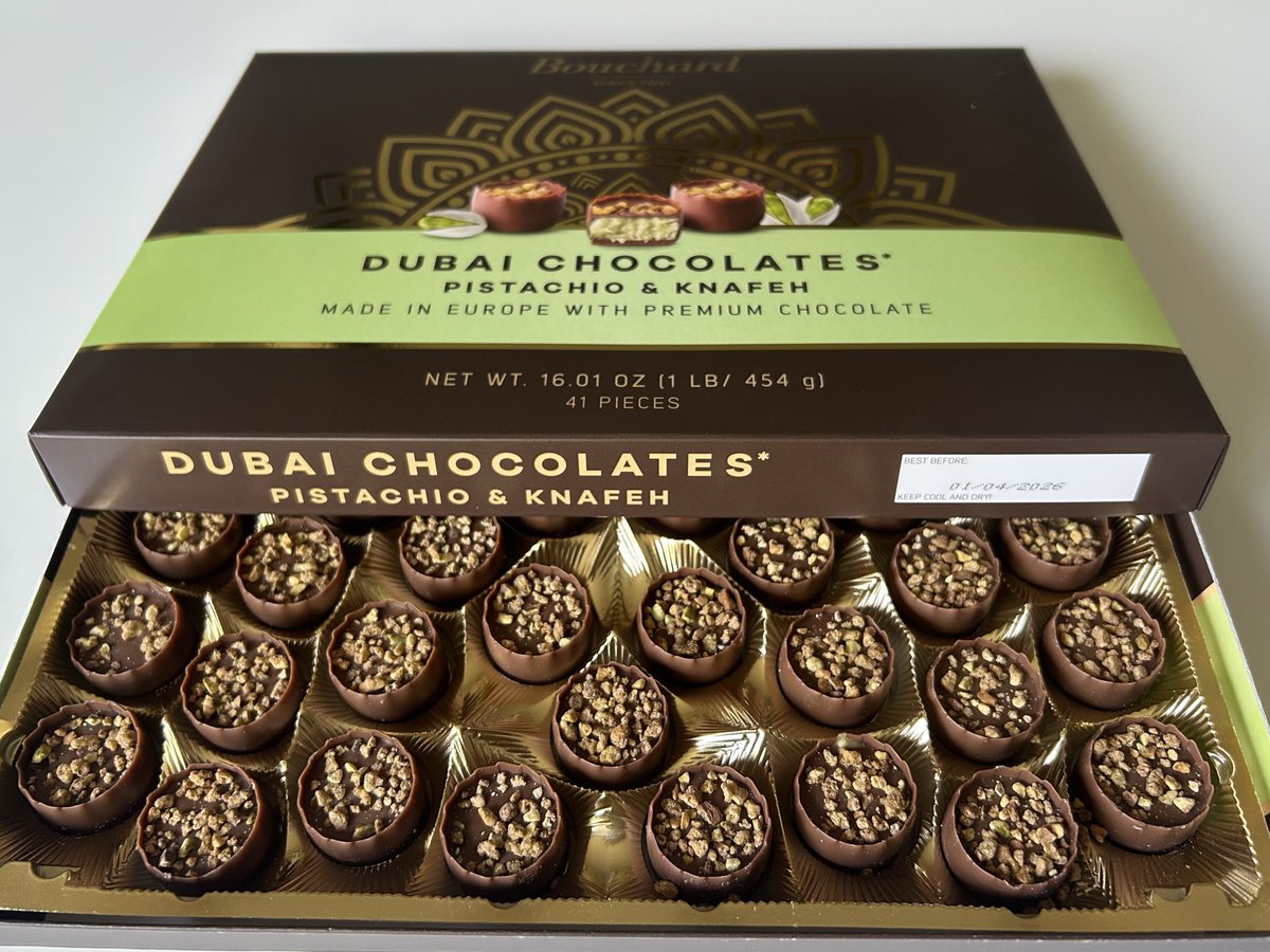 Open box showing 41 pistachio knafeh chocolate cups